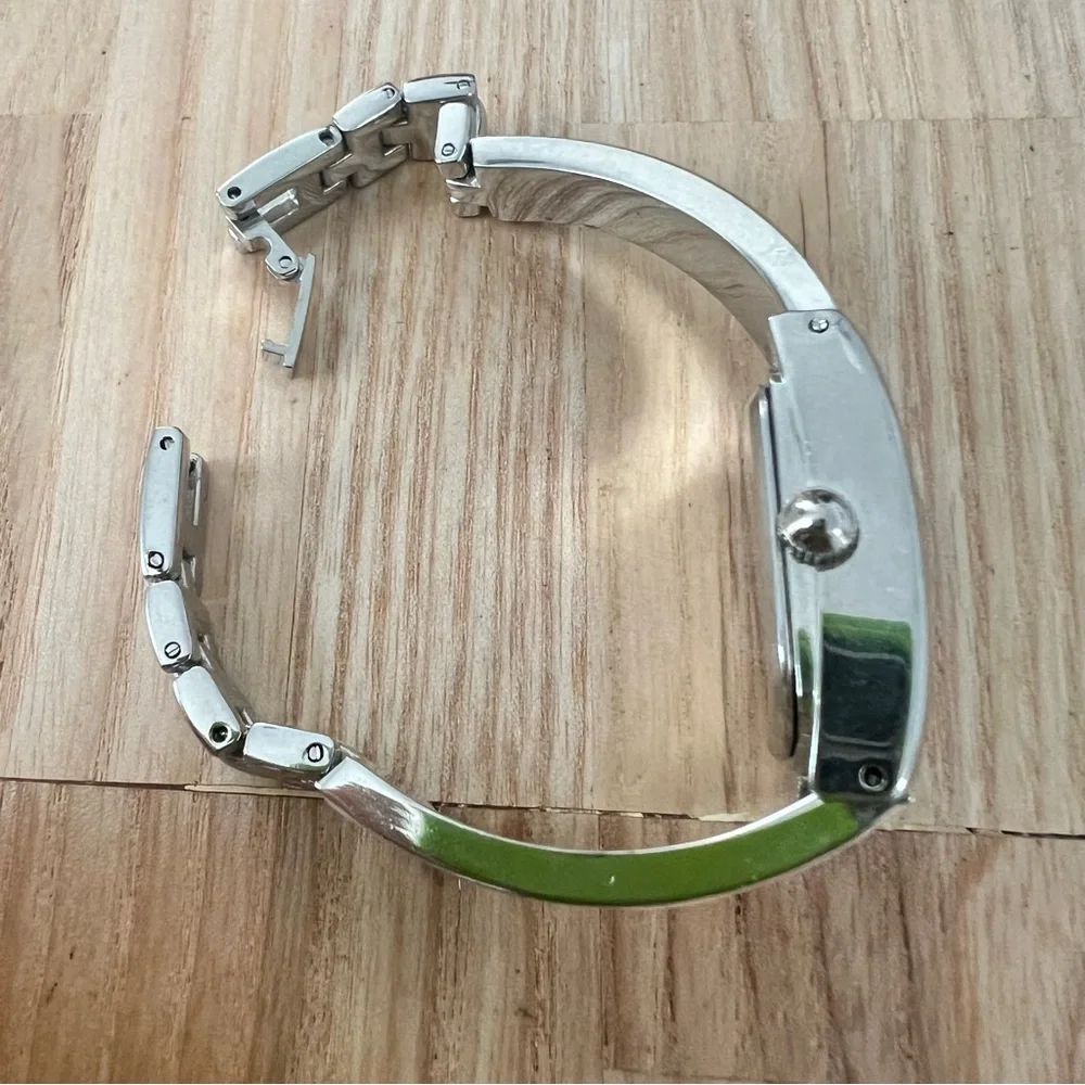 The limited ladies rectangular silver tone bracelet watch NEW BATTERY